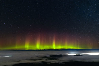 Scenic view of sea against sky at night