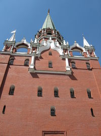 Low angle view of building against blue sky