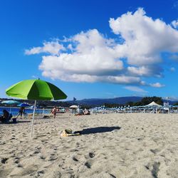 Scenic view of beach against sky