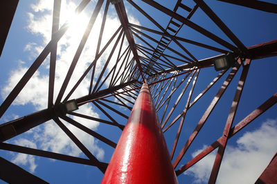 Low angle view of metal structure against sky