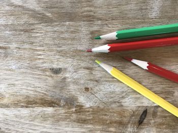 High angle view of colored pencils on table