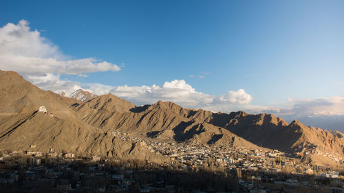 Panoramic view of city buildings against sky