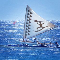 Sailboat on sea against blue sky