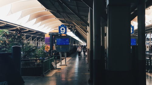 People at railroad station platform