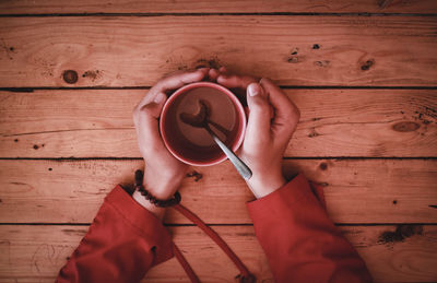 High angle view of coffee cup on table