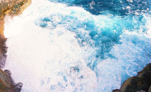 High angle view of surf on shore