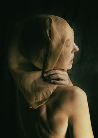 Woman with silk covering her head