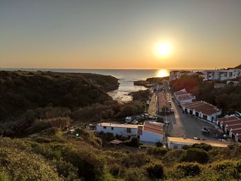 High angle view of sea against sky during sunset