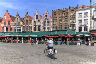 People in front of building