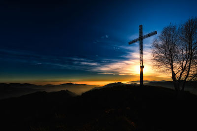 Scenic view of mountains against sky during sunset