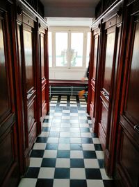 Empty corridor with building in background