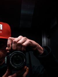 Midsection of man photographing