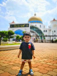 Full length of cute boy