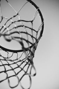 Low angle view of basketball hoop against sky