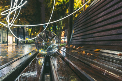 Close-up of crystal ball on bench