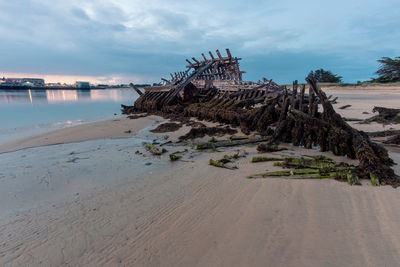 Wrecks of old boats in the boat cemetery of plouhinec in france in the brittany region