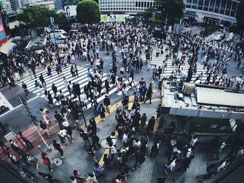 High angle view of crowd on road in city