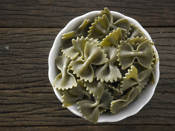 Close-up of farfalle pasta on table