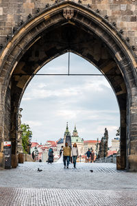 People walking on street in city