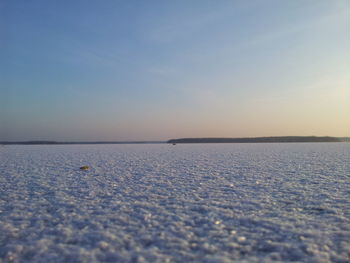 Scenic view of calm sea at sunset