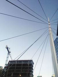 Low angle view of power lines