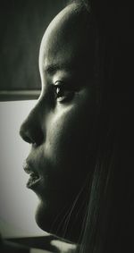 Close-up portrait of serious young woman