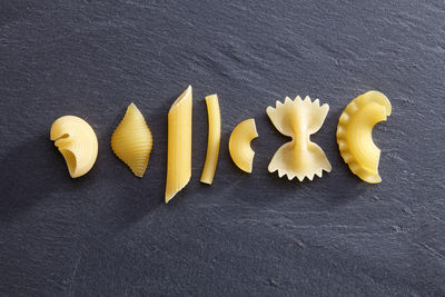 Directly above shot of various pastas on slate