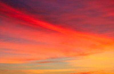 Low angle view of dramatic sky during sunset