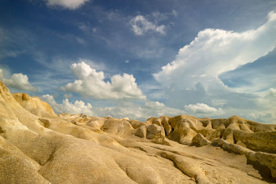 Panoramic view of desert against sky