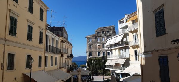 Low angle view of buildings against clear sky