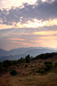 Scenic view of landscape against sky during sunset