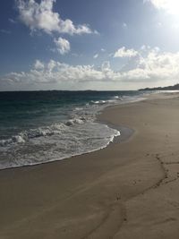 Scenic view of beach against sky