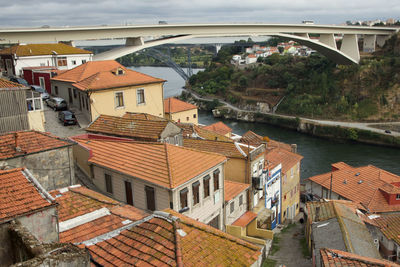 High angle view of residential buildings by canal