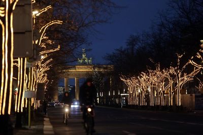 Illuminated street light at night