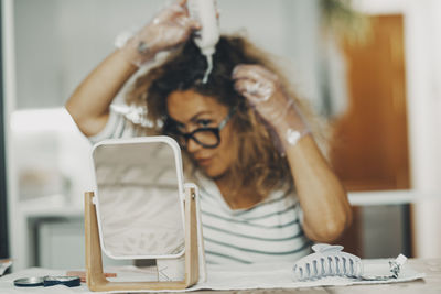 Young woman using mobile phone