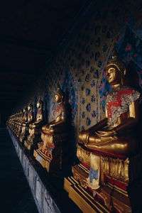 Statue in temple outside building