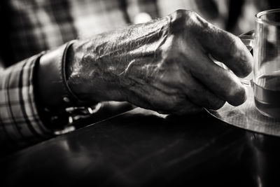 Close-up of man preparing food