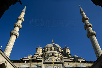 Low angle view of building against blue sky