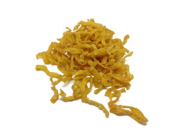Close-up of orange against white background