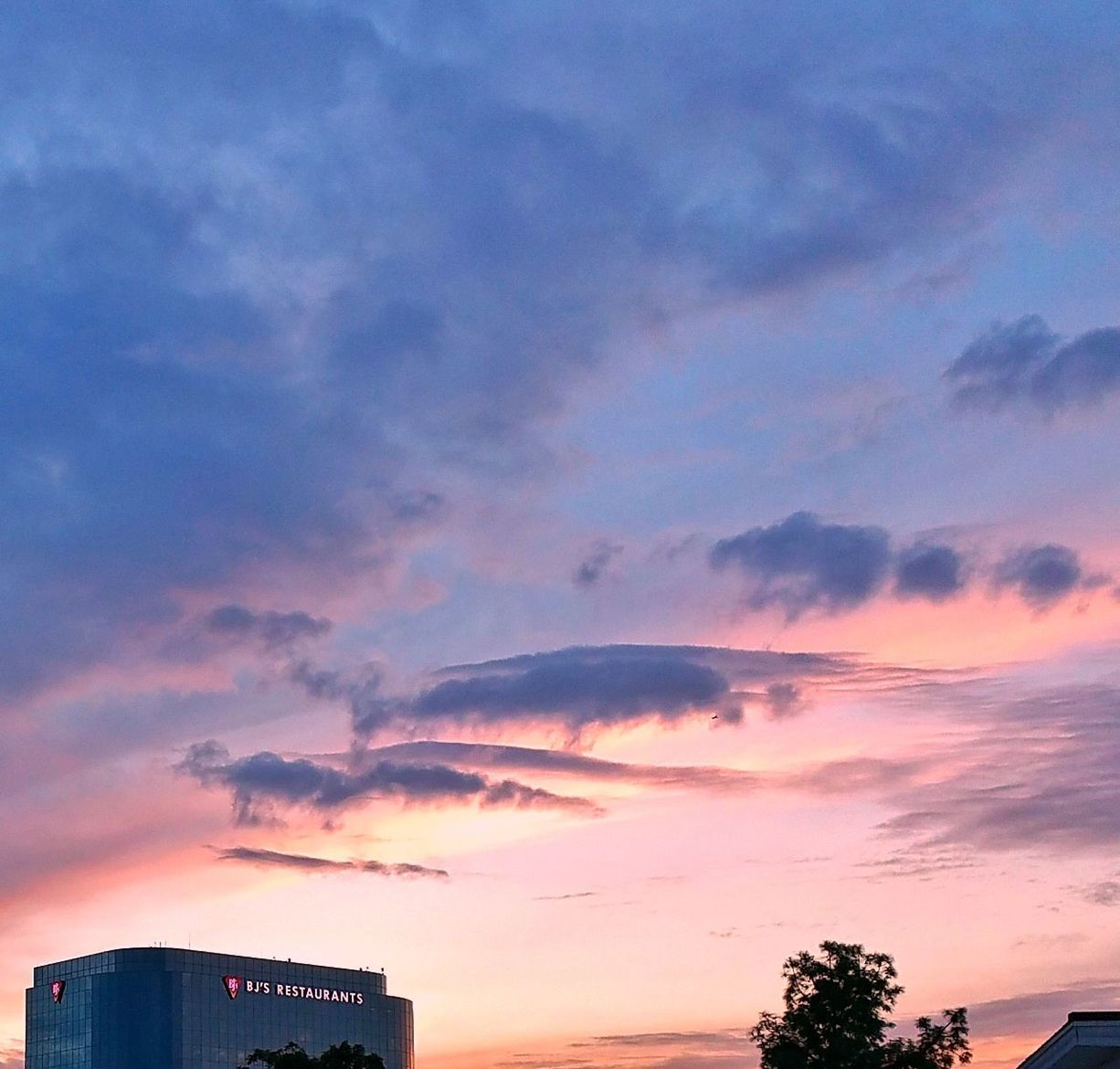 sunset, cloud - sky, sky, architecture, built structure, building exterior, no people, outdoors, low angle view, city, nature, beauty in nature, day