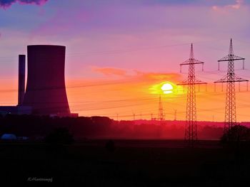 Electricity pylon at sunset