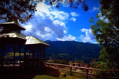 Built structure with mountain range in background