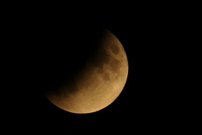 Low angle view of moon against sky at night