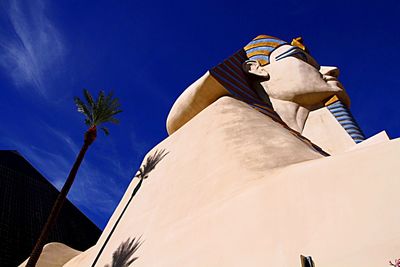 Low angle view of built structure against blue sky