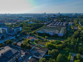 High angle view of buildings in city against sky