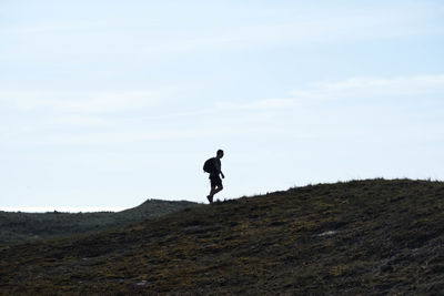 Full length of man walking on land