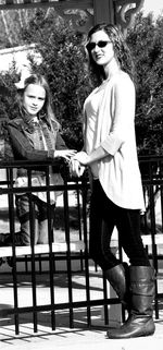 Portrait of young couple standing outdoors