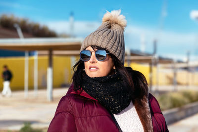 Young woman wearing sunglasses
