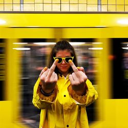 Portrait of young woman in sunglasses