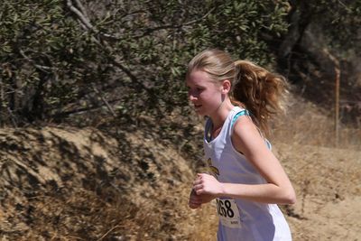 Teenage girl running marathon